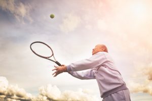 Man serving a tennis ball